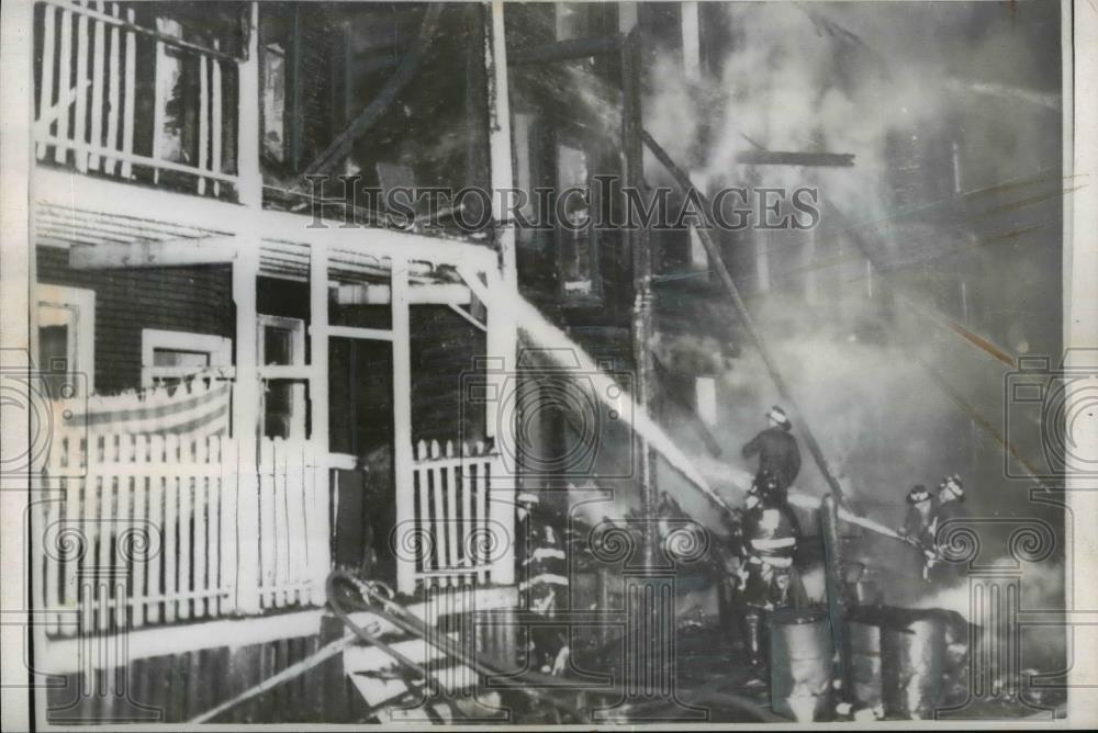 1959 Press Photo Firemen battling flames at six family tenament s in Boston. - Historic Images