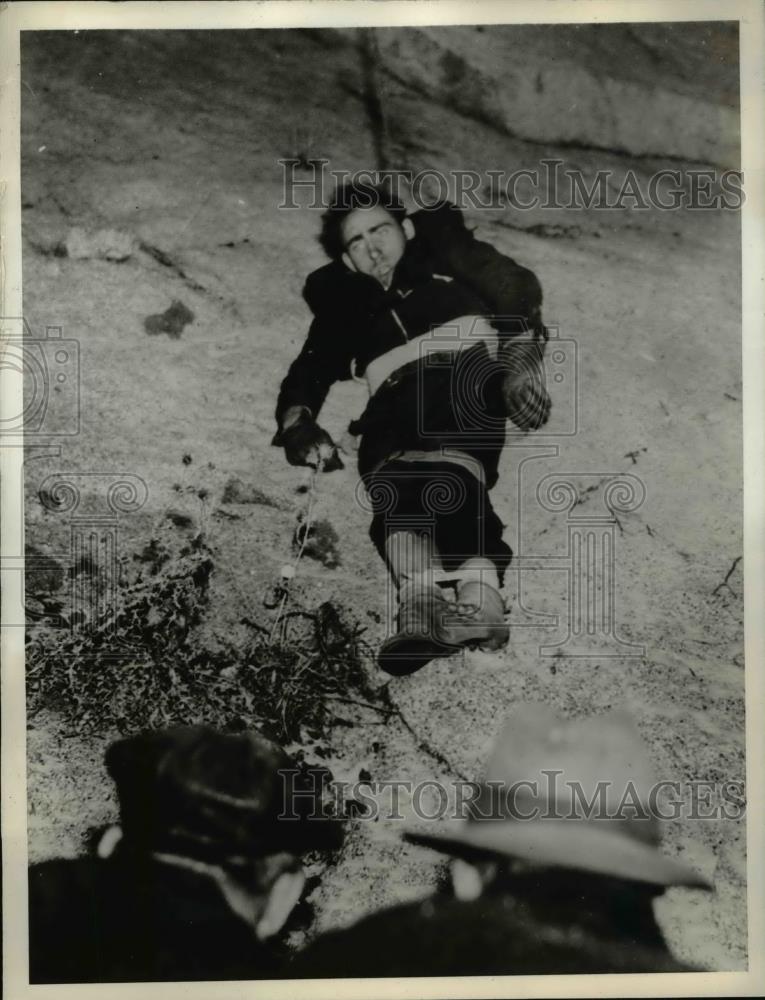 1936 Press Photo Deer Hunter Lloyd Rawsom Rescued After 300 Foot Fall, Utah - Historic Images