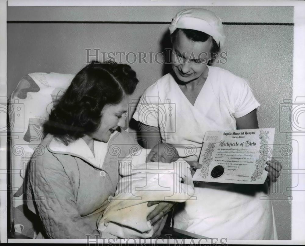 1957 Press Photo Mrs. John Kolesar Holds Infant Son Bradley Born 1 Minute Late - Historic Images