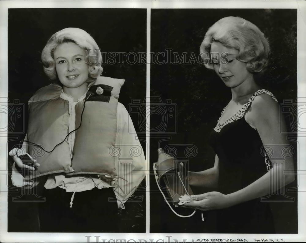 1962 Press Photo Aqualite Emergency Beacon light can packed with light jacket. - Historic Images