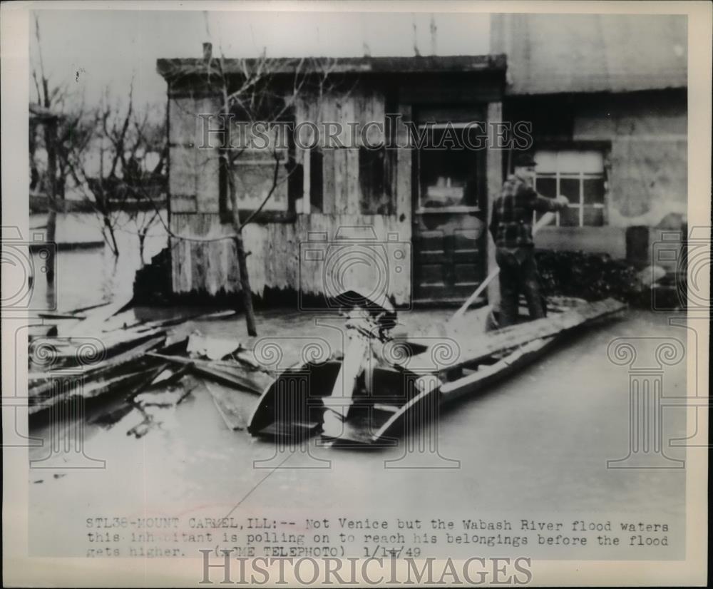 1949 Press Photo Man Stands in Boat Wabash River Flood in Mount Carmel Illinois - Historic Images