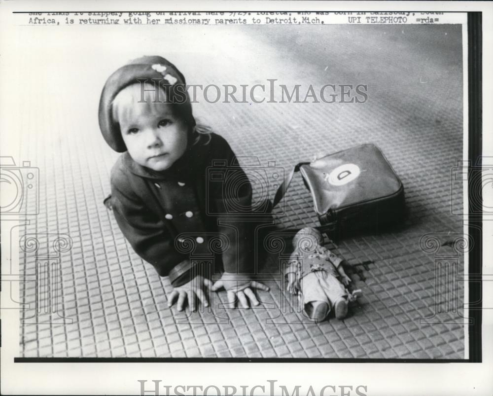 1958 Press Photo Child returns to Detroit , Michigan with Missionary Parents - Historic Images