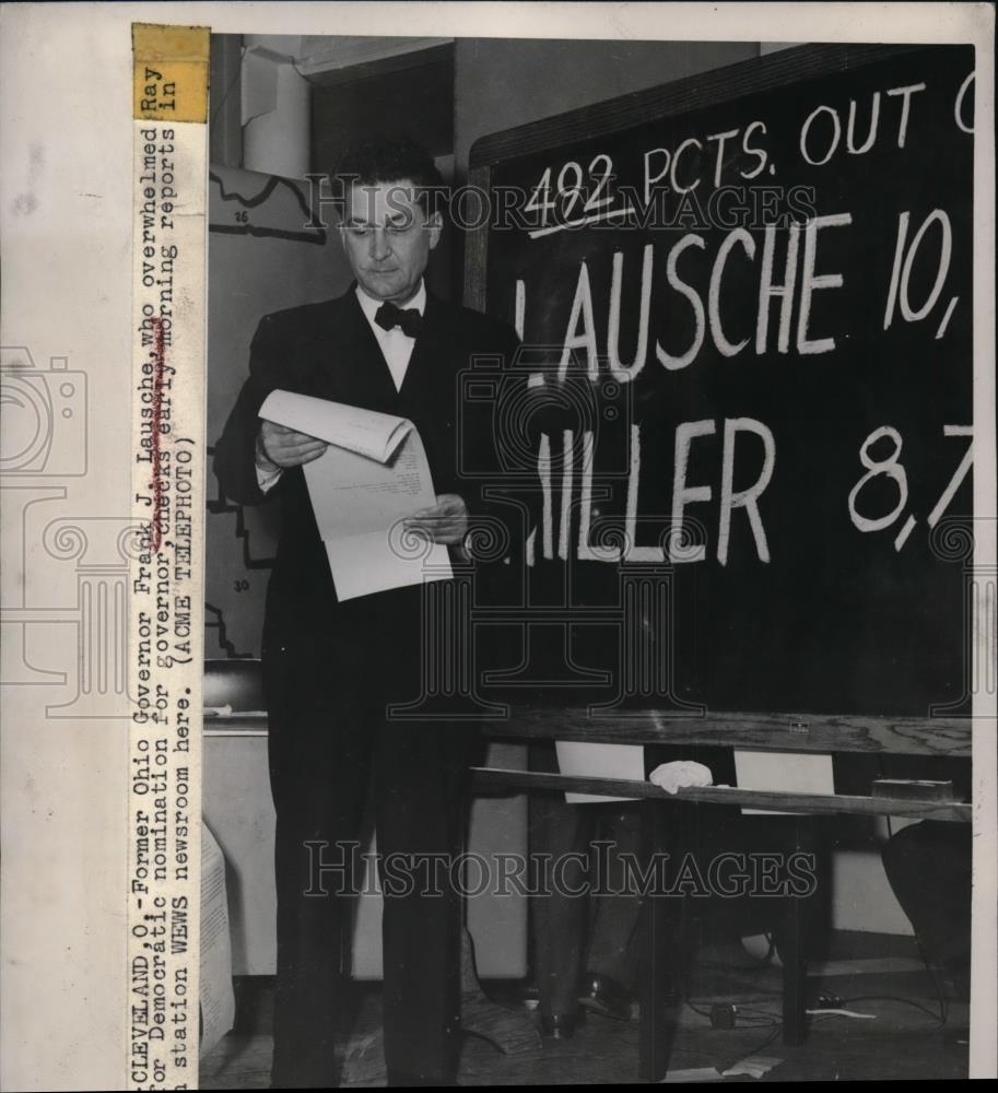 1948 Press Photo Ohio Governor Frank J. Lausche Checks News Reports - Historic Images