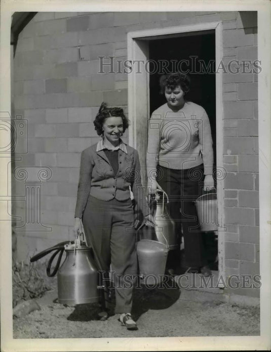 1946 Press Photo Marcella Shirakus, Dorothea Bauer & milk pails at a farm - Historic Images