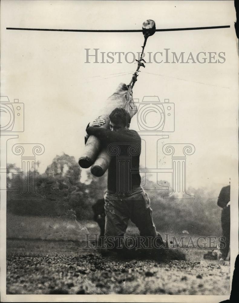 1929 Press Photo Romeo Japar Tackling job - nee67886 - Historic Images