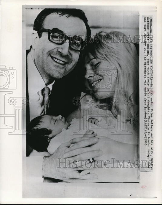 1965 Wire Photo Peter Sellers and Britt Eklund Pose with Their Daughter - Historic Images