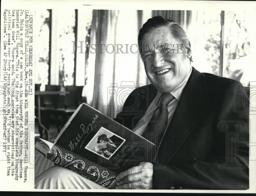 1973 Wire Photo Will Rogers Jr.  with the copy of biography book of his father - Historic Images