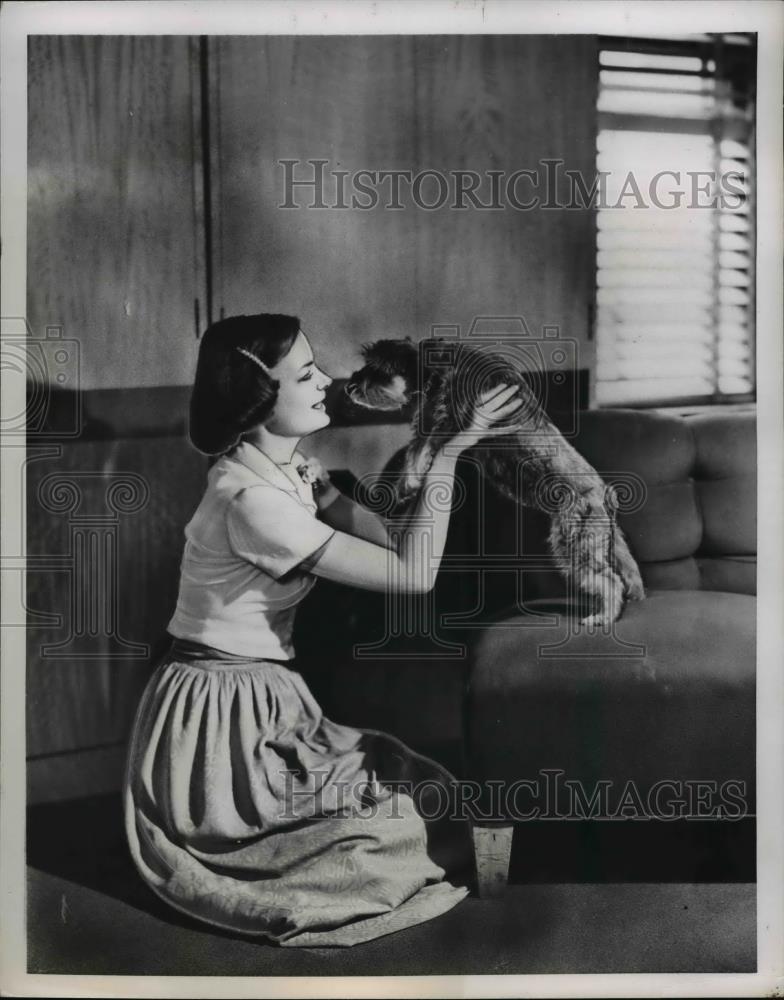 1951 Press Photo A young girl and het puppy at their home - nee85940 - Historic Images