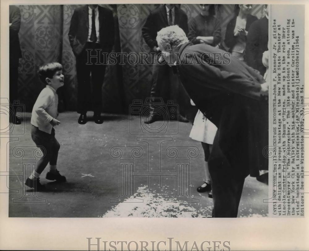 1964 Wire Photo Kennedy Jr. meets O&#39;Brian at backstage in NY State Theater - Historic Images