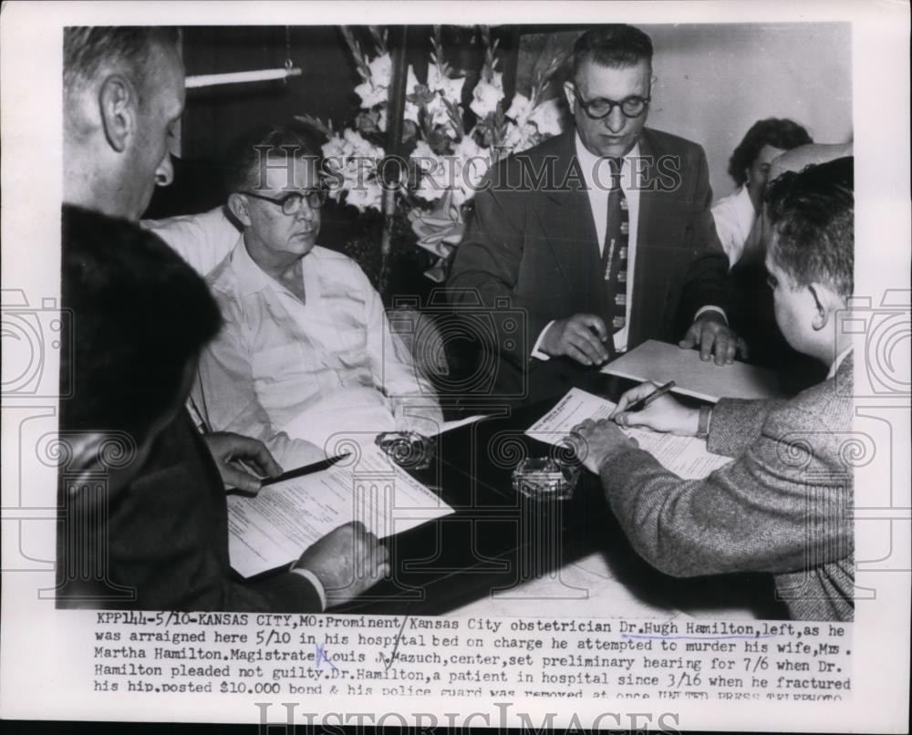 1954 Press Photo Dr.Hugh Hamilton arraigned in his hospital bed on murder charge - Historic Images