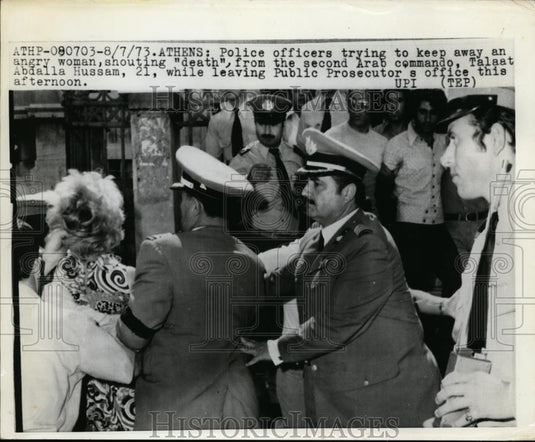 1973 Press Photo Athens police & woman scraeaming at Arab Talaat A Hussam - Historic Images