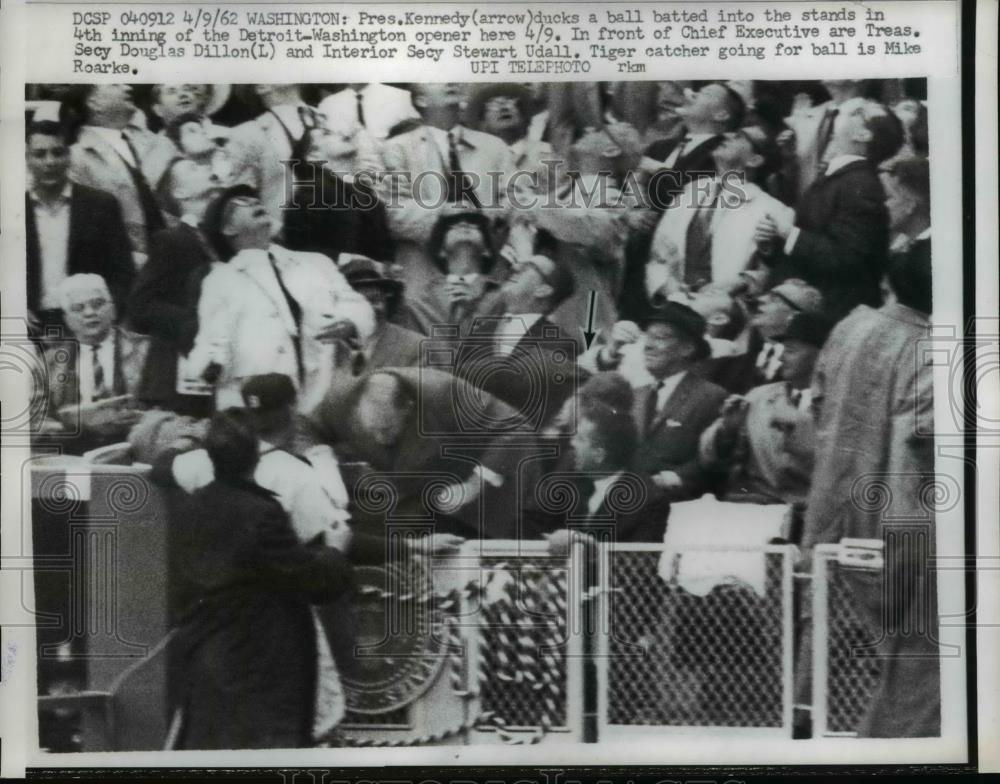 1962 Press Photo Pres.Kennedy ducks a ball in Detroit-Washington Opener Game. - Historic Images