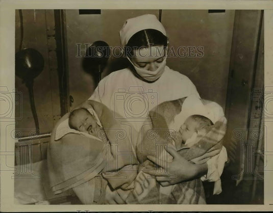 1937 Press Photo A nurse with baby twins abandoned near Buffalo NY - nee84845 - Historic Images