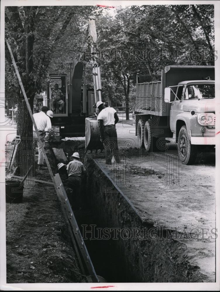 1965 Press Photo Storm sewer replacement work in Shaker Heights Ohio - nee88345 - Historic Images