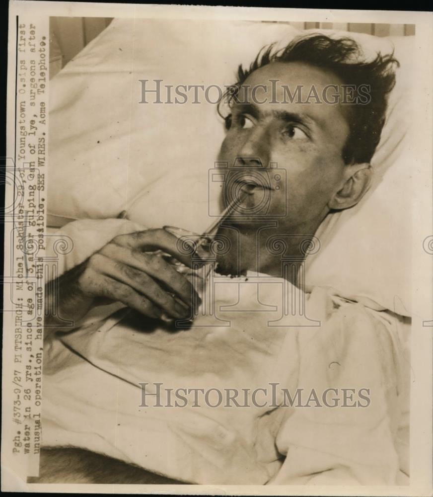 1947 Press Photo Michel Sahustor sips first water in 26 years since age of 3 - Historic Images