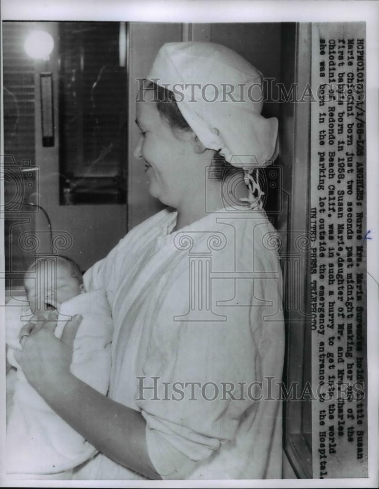 1958 Press Photo Nurse Maria Surendas &amp; baby Marie ChioGini New Year baby - Historic Images