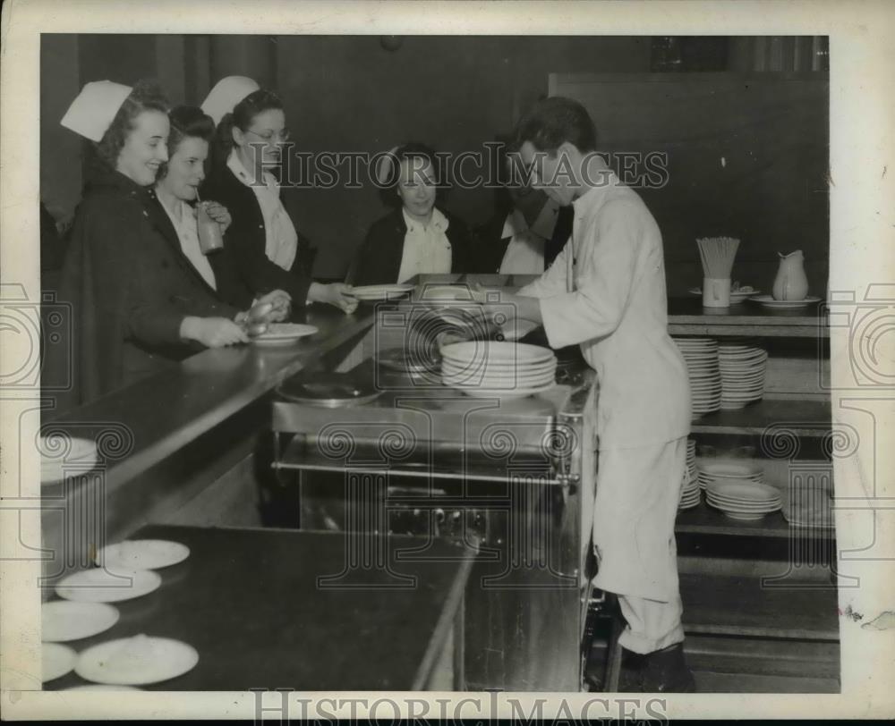 1943 Press Photo Cafeteria style meals served to some nurses, J Mramor, J Hobf - Historic Images