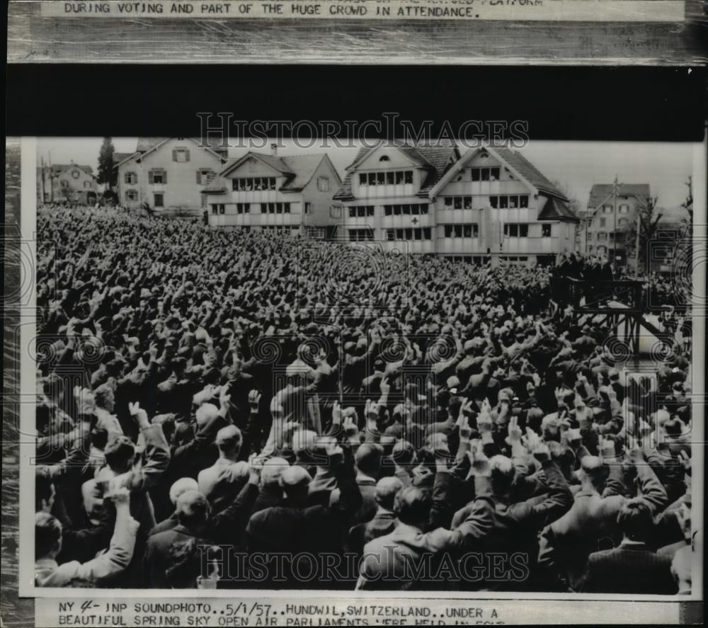 1957 Press Photo Swiss People under spring sky air parliaments to vote. - Historic Images