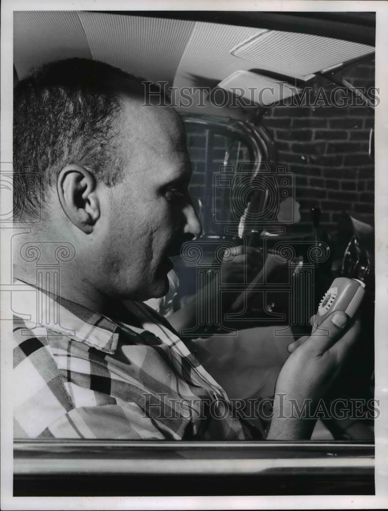 1961 Press Photo Dr. David Caul talking into dictating and transcribing machine - Historic Images