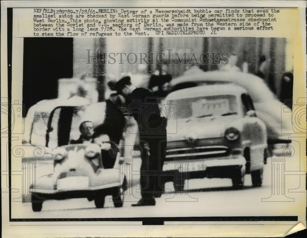 1961 Press Photo Driver of a bubble car checked by East German Guards. - Historic Images