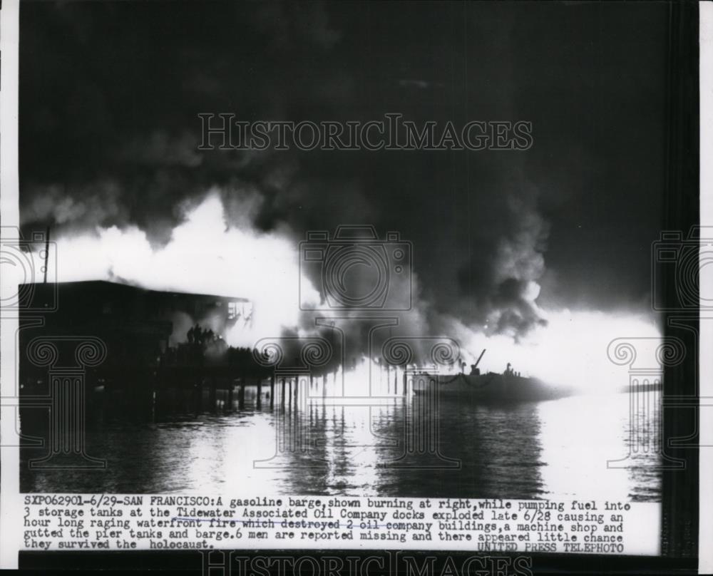 1956 Press Photo Gasoline Barge burning at the Tidewater Associates Oil Company - Historic Images