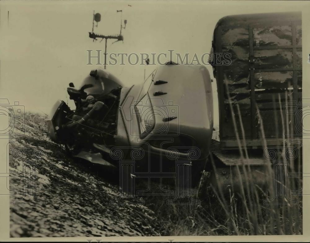 1940 Press Photo A semi truck overturned &amp; crashed on a roadside - nee84777 - Historic Images