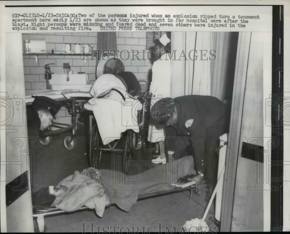 1956 Press Photo Two persons injured in Tenement Apartment Explosion at Chicago - Historic Images