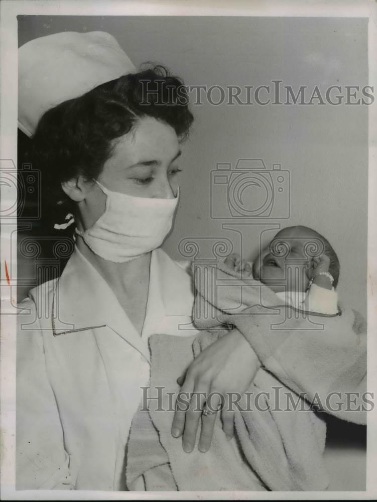 1952 Press Photo Nurse Lily Connell &amp; Leap Year baby Rothman Cleveland Ohio - Historic Images