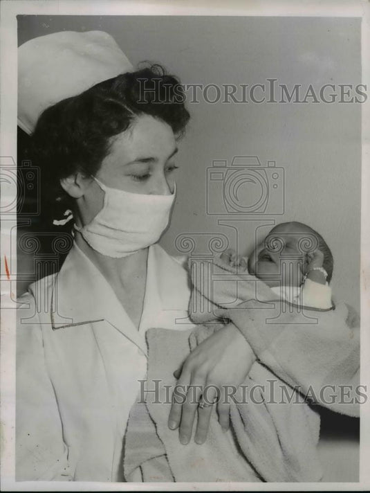 1952 Press Photo Nurse Lily Connell & Leap Year baby Rothman Cleveland Ohio - Historic Images