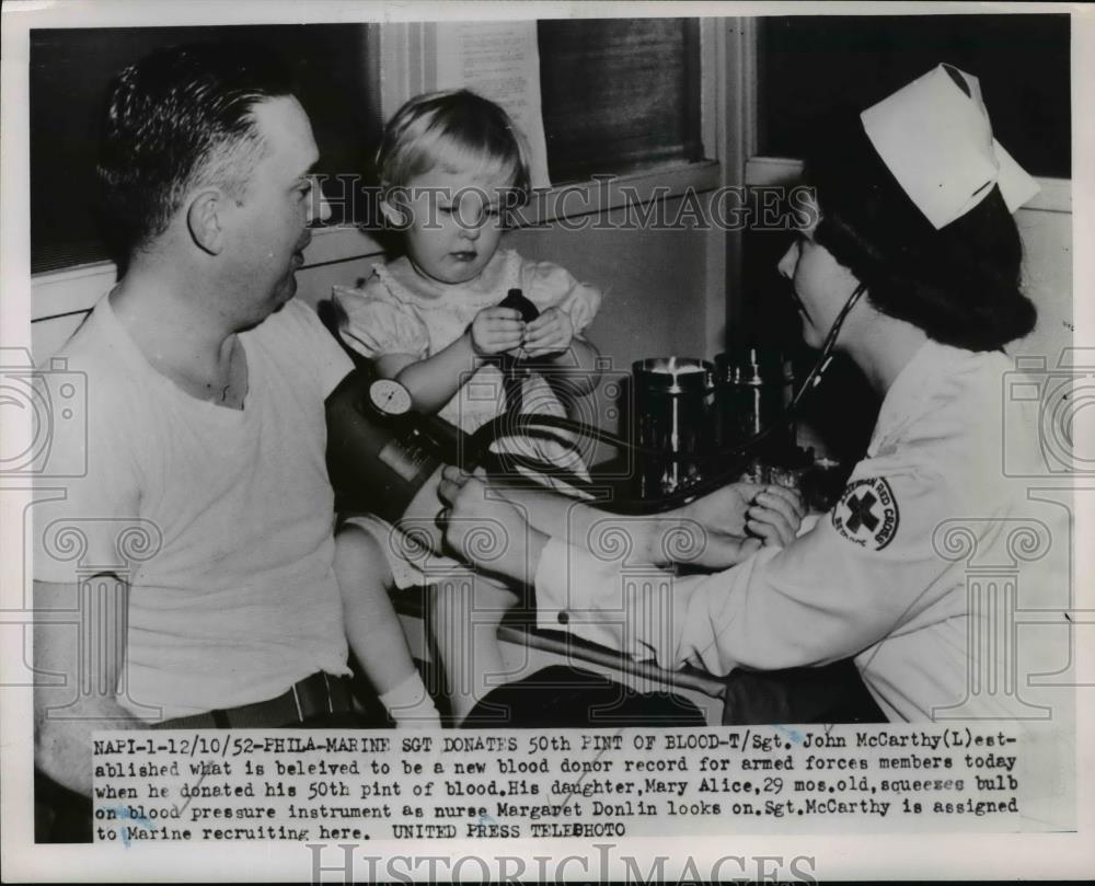 1952 Press Photo U.S Marine T/Sgt John McCarthy donates 50th of his blood - Historic Images