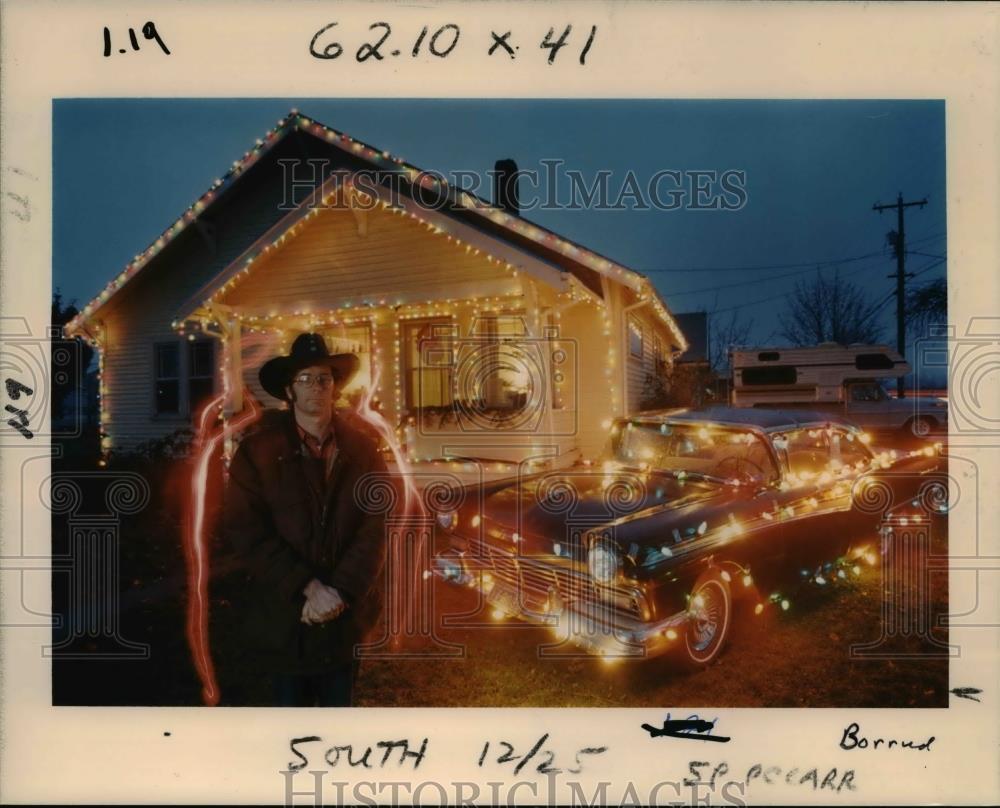 1986 Press Photo Larry Benson takes on ghostly image next to 29657 Ford hardtop - Historic Images