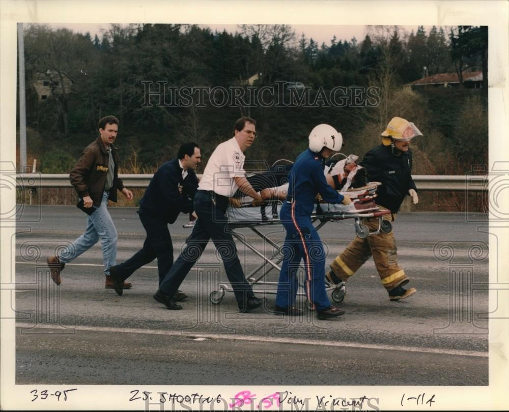 1995 Press Photo Thomas Lee Nunes Shooting Victim Carried Stretcher - ora67908 - Historic Images