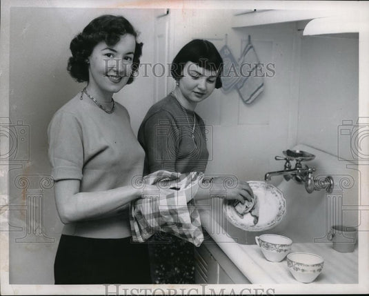 1955 Press Photo Woman & daughter doing dishes in home kitchen - Historic Images