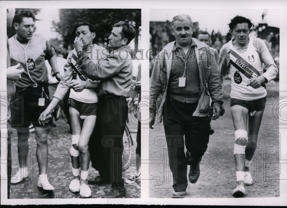 1954 Press Photo Gilbert Roger faints in 330 mile Strasbourg Paris walkathon - Historic Images