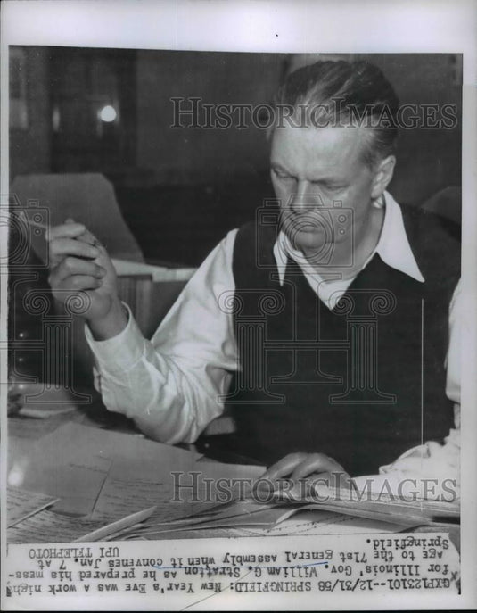 1958 Press Photo William G Stration works late on New Year's Eve - nee92804 - Historic Images