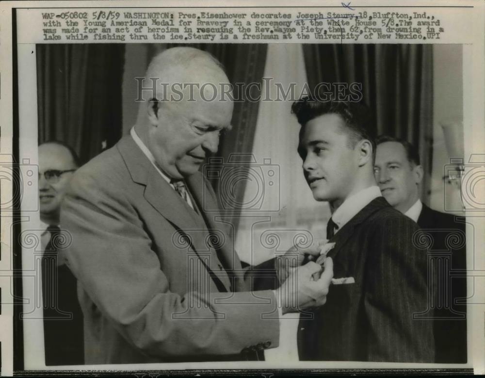 1959 Press Photo President Eisenhower Puts Medal To Joseph Steury - nee91405 - Historic Images