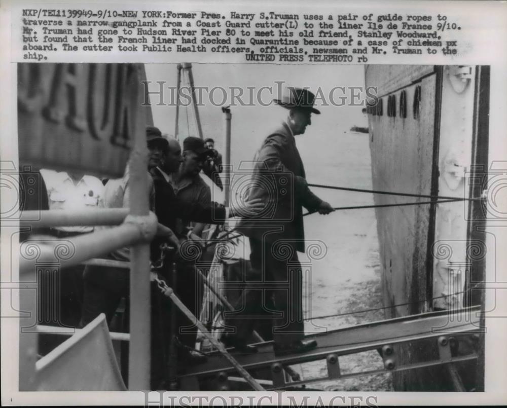 1957 Press Photo Harry S. Truman enters narrow gangplank to Line Ile de France - Historic Images