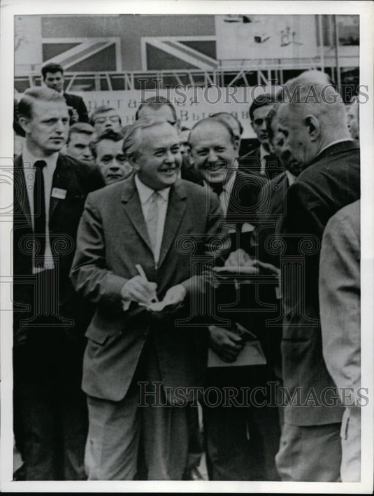 1956 Press Photo British Prime Minister Harold Wilson takes mock order - Historic Images