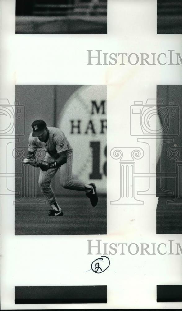 Press Photo Mack brings his glove up and the Ball comes out - cvb58235 - Historic Images