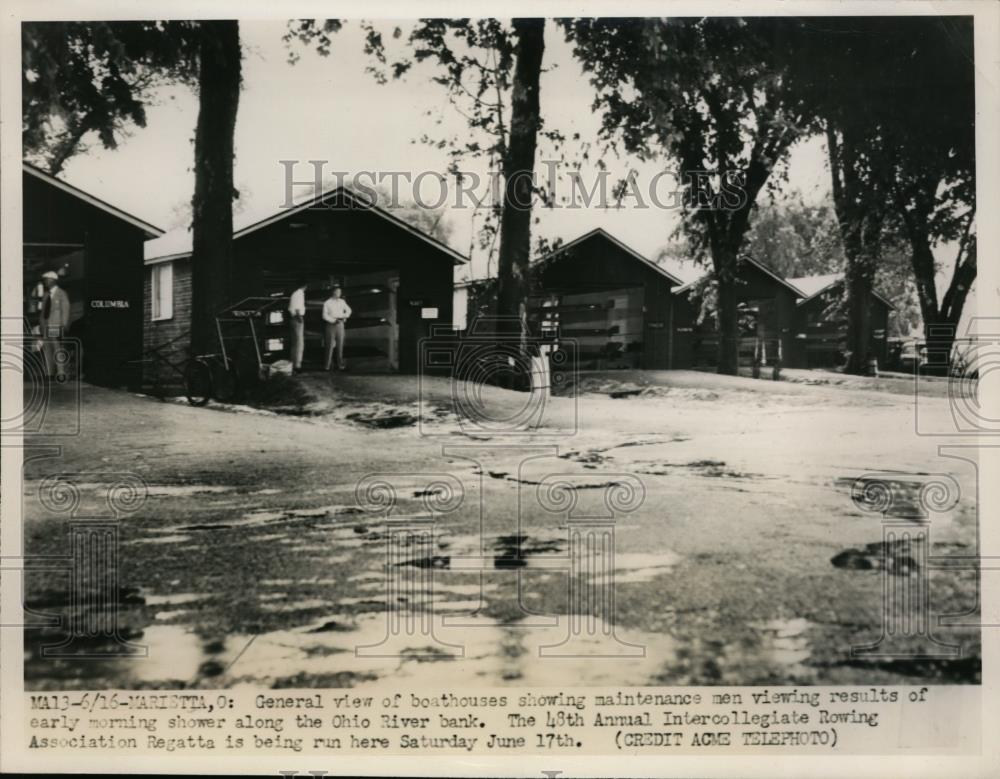 1950 Press Photo Maintenance men of Boathouses view result of morning shower - Historic Images