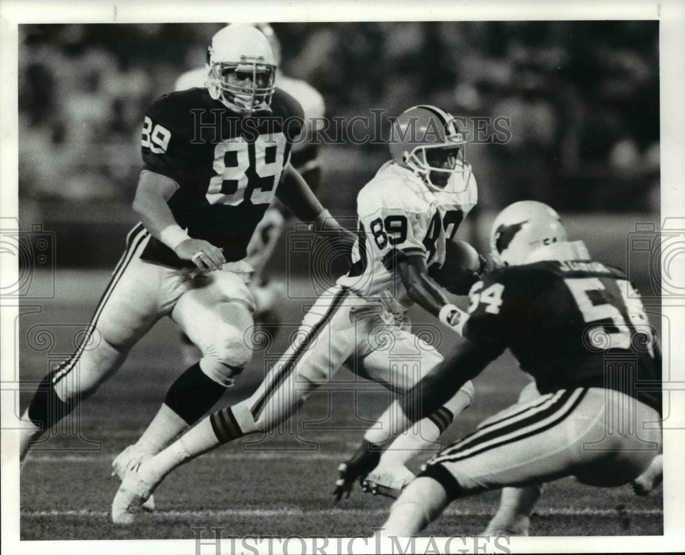 1987 Press Photo McNeil Runs 55 yds. for a Td with a punt in the 2nd quarter - Historic Images