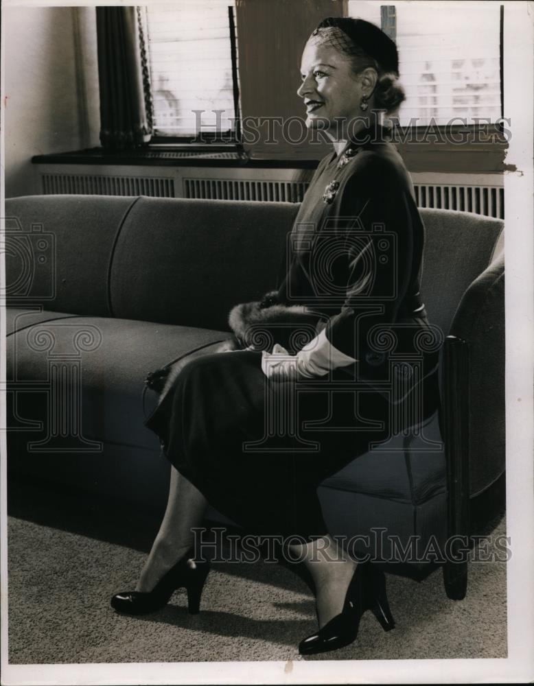 1951 Press Photo Woman Sitting On Sofa - nef00040 - Historic Images