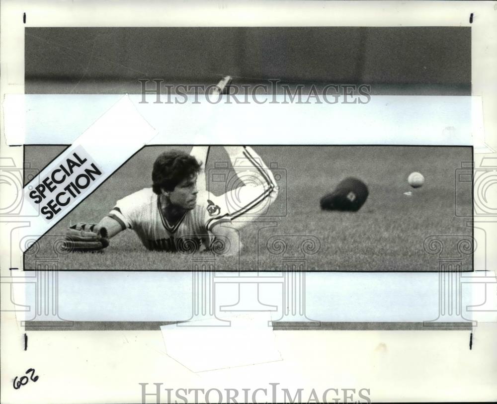 1984 Press Photo Butler dives for hit by Dauer in 3rd inning. - cvb57793 - Historic Images