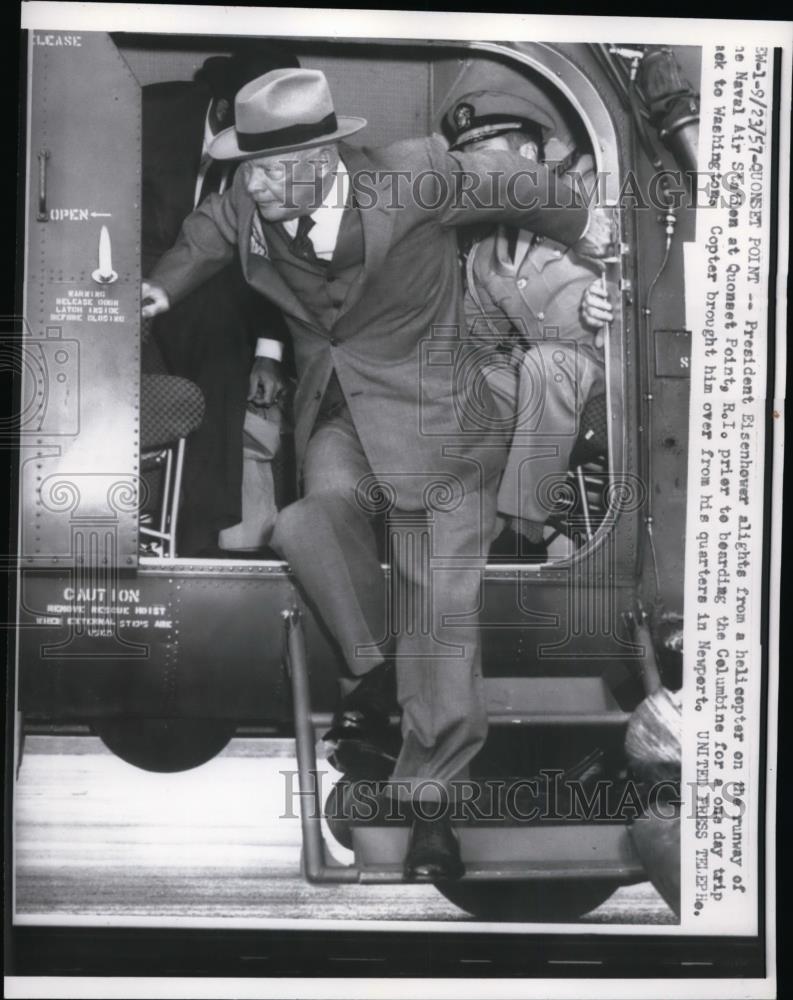 1957 Press Photo President Eisenhower alights from helicopter on runway - Historic Images