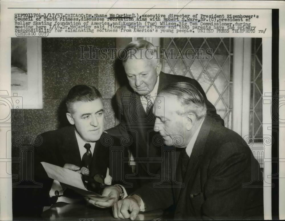 1957 Press Photo Dr Shane McCarthy discusses Presidents youth fitness plan - Historic Images