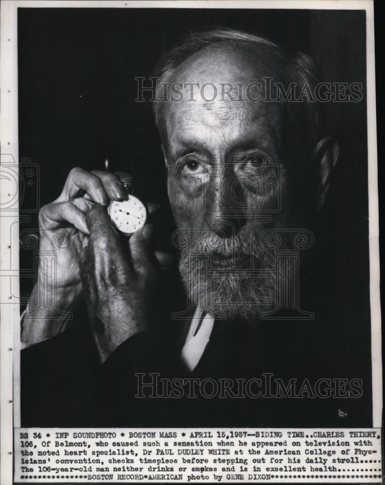 1957 Press Photo Charles Thiery checks timepiece before going on daily walk - Historic Images