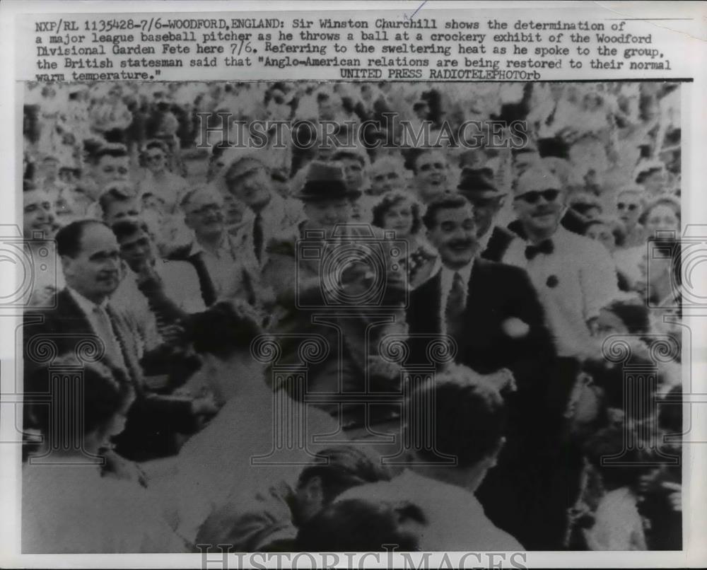 1957 Press Photo Winston Churchill throws a baseball at Woodford Div Garden Fete - Historic Images