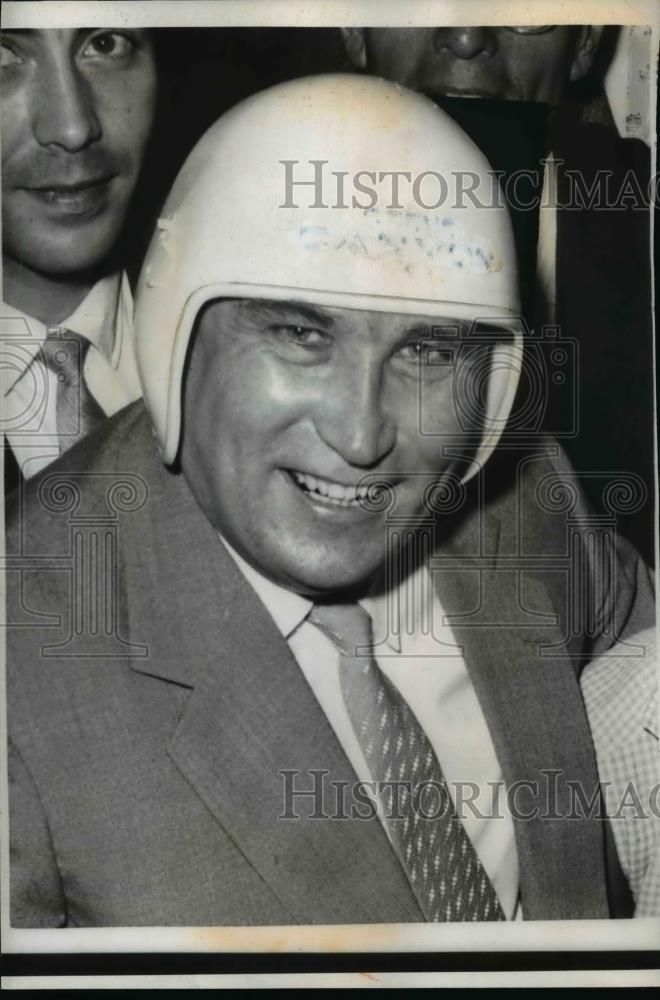 1959 Press Photo Soviet First Deputy Premier Frol R. Kozlov models a helmet - Historic Images