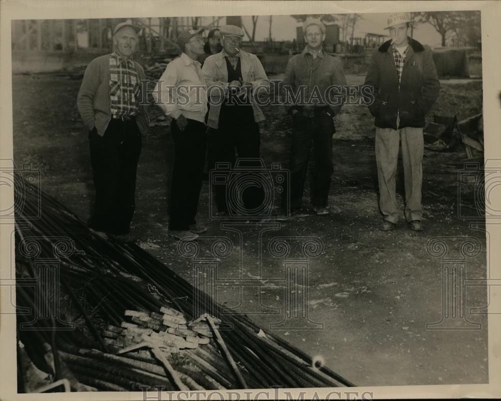 1952 Press Photo Works on a Holiday - nee94154 - Historic Images