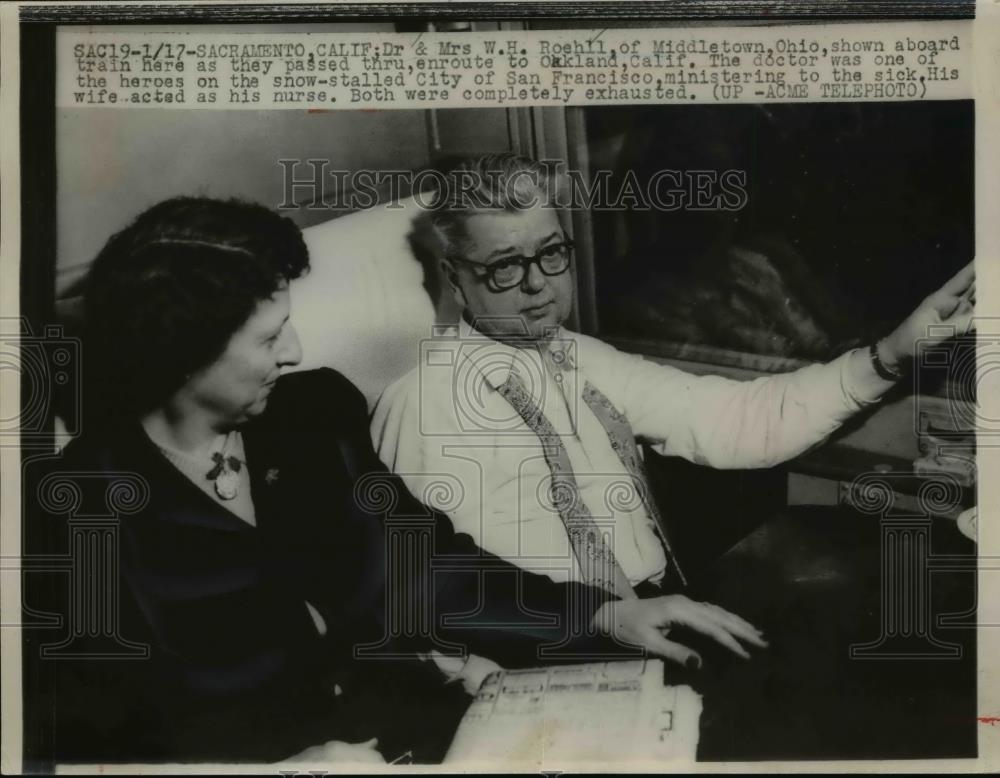 1952 Press Photo Dr. and Mrs.W.H.Roehll doctors on snow stalled of San Francisco - Historic Images